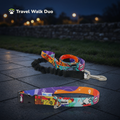 Travel Walk Duo: Travel print collar and shock-absorbing lead on a footpath at dusk